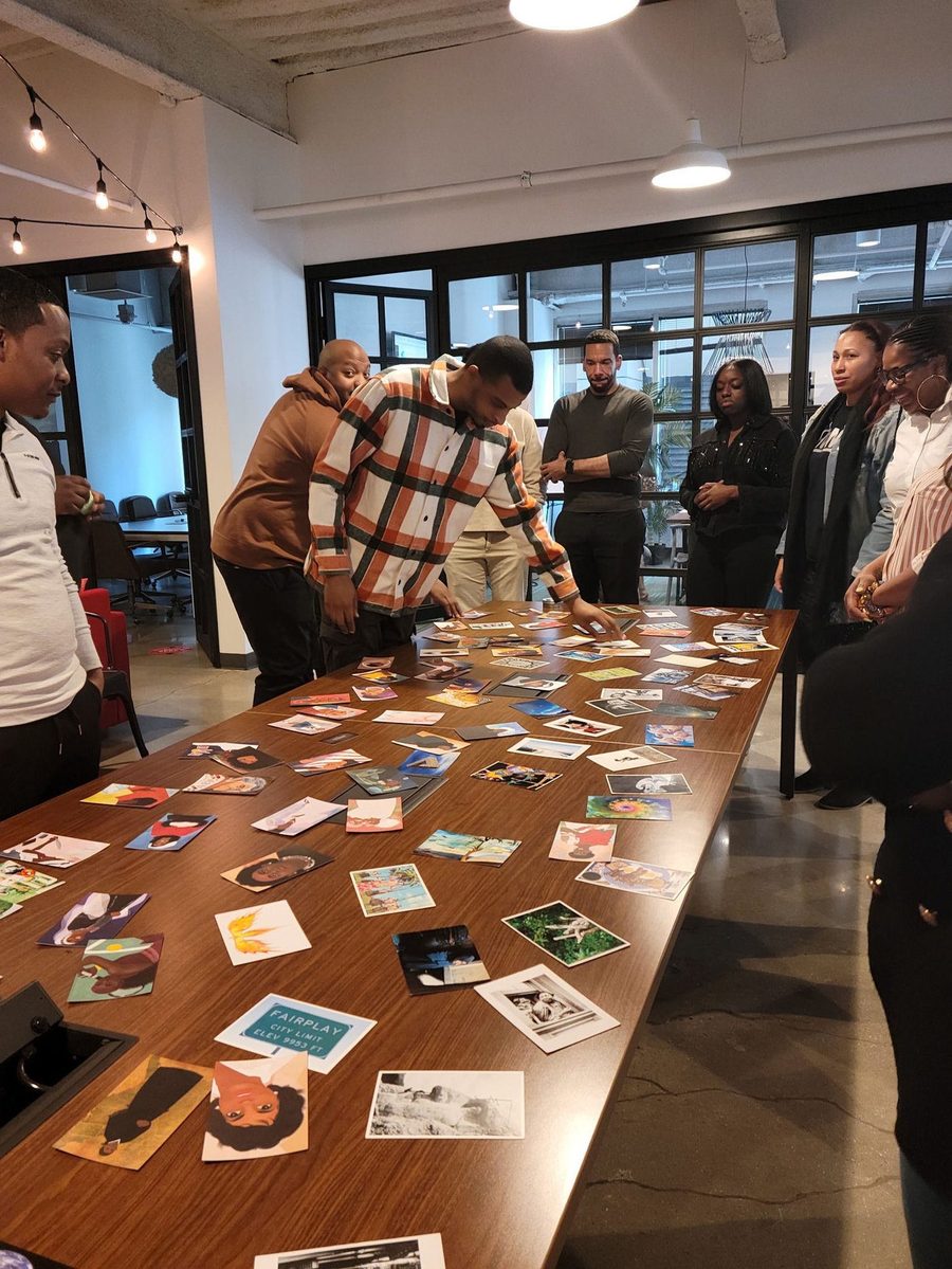 Participants exploring image cards during a facilitated exercise